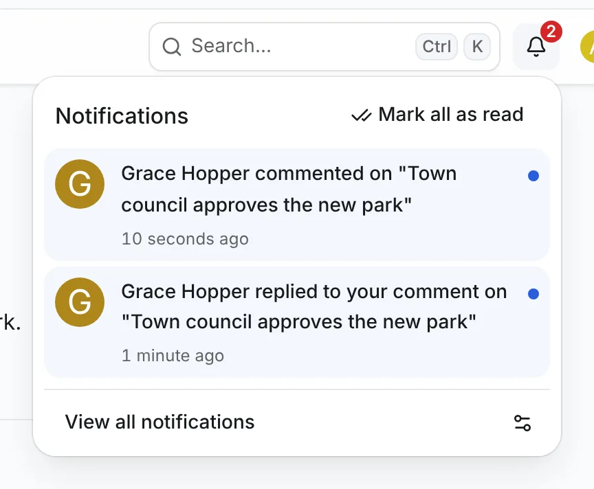 The notification bell open with two unread notifications: 'Grace Hopper commented on Town council approves the new park' and 'Grace Hopper replied to your comment on Town council approves the new park'