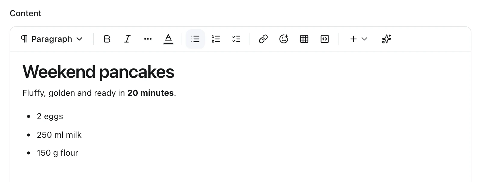 Content field in the blog article form: a toolbar with paragraph style, bold, italic, lists, link, emoji, table and code buttons above a document with the heading Weekend pancakes, a sentence with 20 minutes in bold and a three-item bullet list
